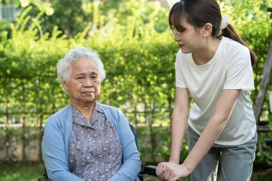Caregiver help and care Asian senior or elderly old lady woman p